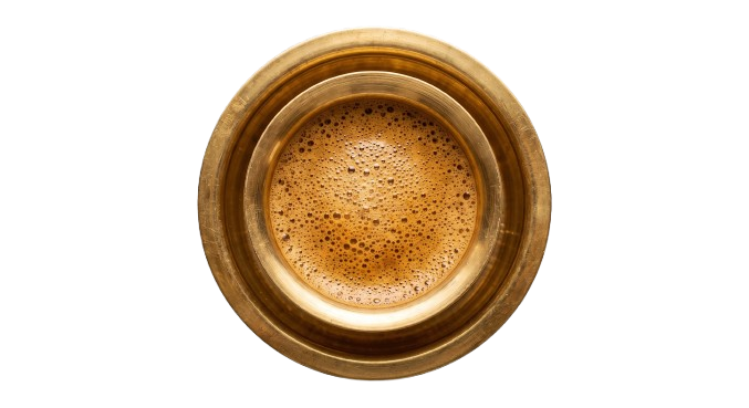 South Indian filter coffee served in a traditional cup and davara