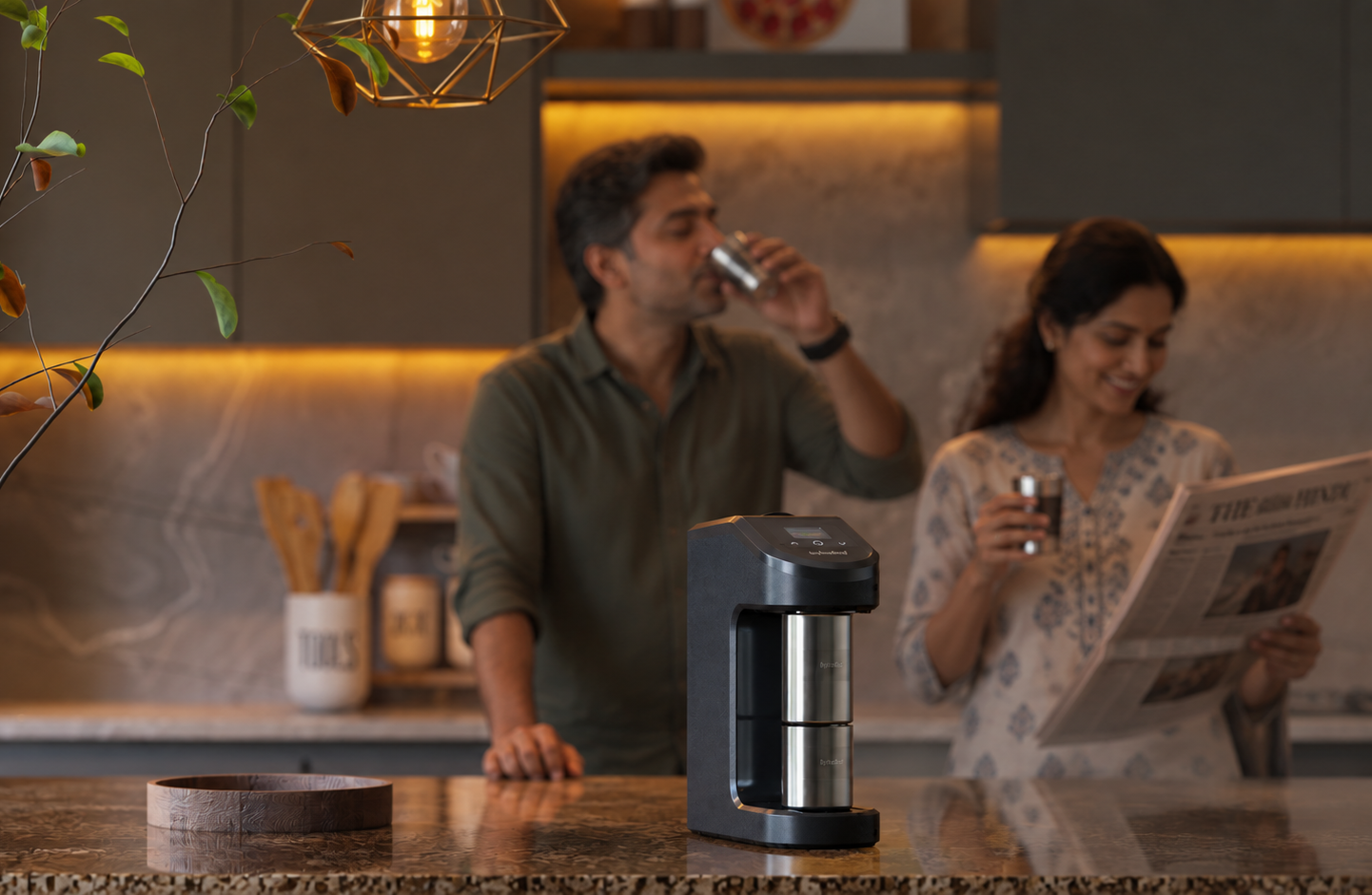 ByteChef coffee machine on a kitchen counter as a couple enjoys filter coffee